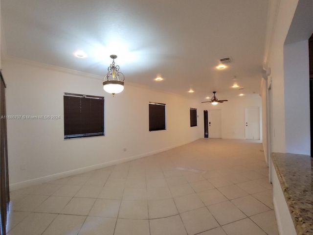 Home for sale at 3377 NE 4th St - photo 5726613