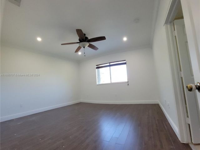 Home for sale at 3377 NE 4th St - photo 5726614