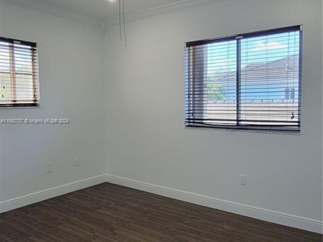 Home for sale at 3377 NE 4th St - photo 5726615