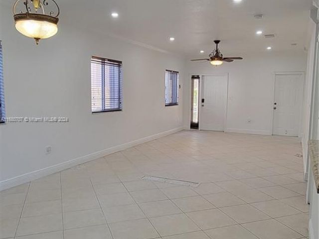 Home for sale at 3377 NE 4th St - photo 5726617