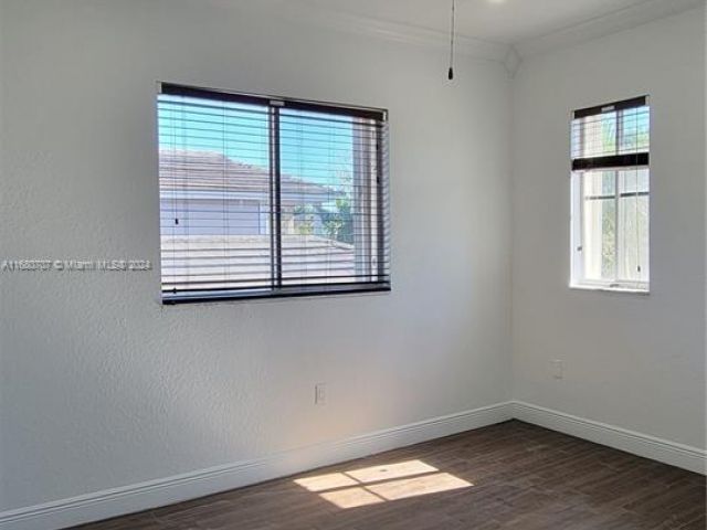 Home for sale at 3377 NE 4th St - photo 5726618