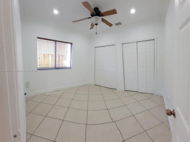 Home for sale at 3377 NE 4th St - photo 5726620