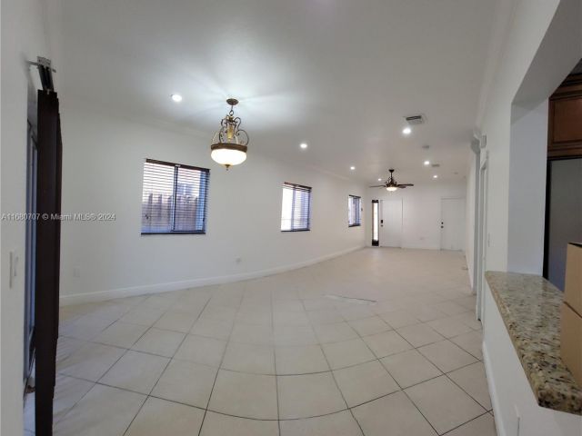 Home for sale at 3377 NE 4th St - photo 5726624