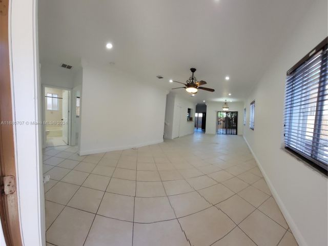 Home for sale at 3377 NE 4th St - photo 5726626