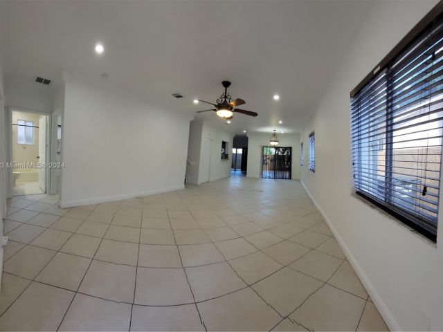 Home for sale at 3377 NE 4th St - photo 5726629