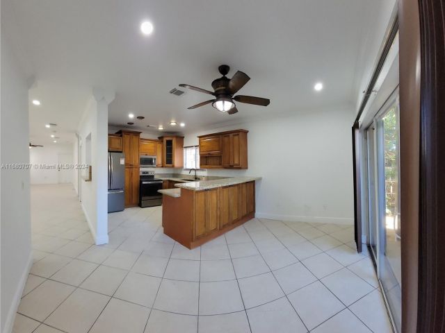 Home for sale at 3377 NE 4th St - photo 5726630