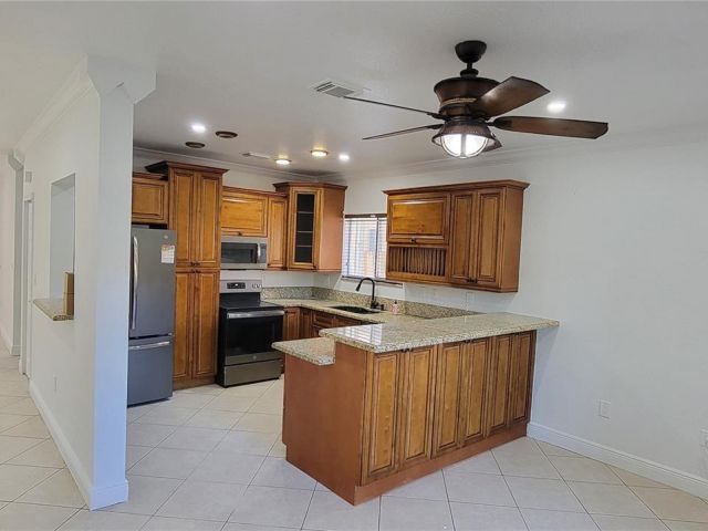 Home for sale at 3377 NE 4th St - photo 5726631