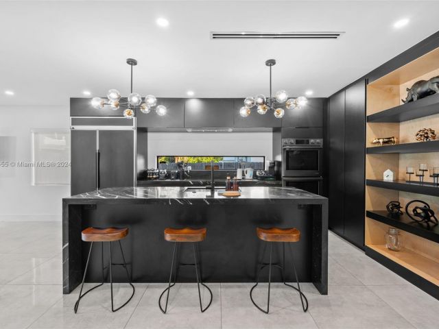 Home for sale at 861 NE 82nd St - photo 5709415