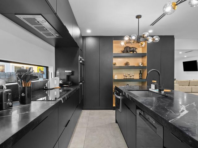 Home for sale at 861 NE 82nd St - photo 5709418