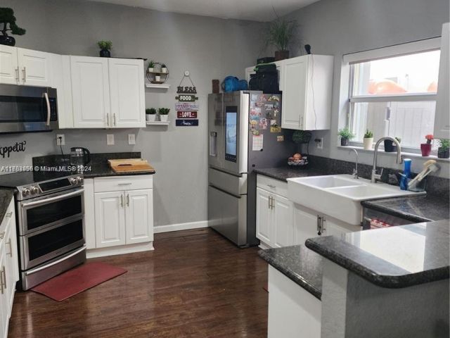 Home for sale at 229 NE 36th Ter - photo 6009577