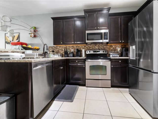 Home for sale at 9831 NW 88th Ter - photo 5585054