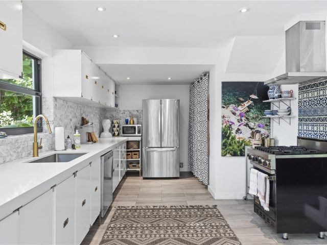 Home for rent at 1210 NE 89th St - photo 5694088