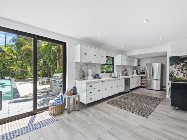 Home for rent at 1210 NE 89th St - photo 5694089