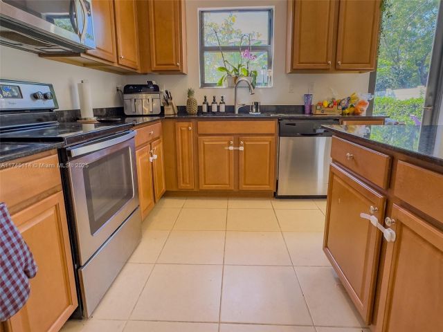 Home for sale at 686 NE 191st Ter - photo 5991047