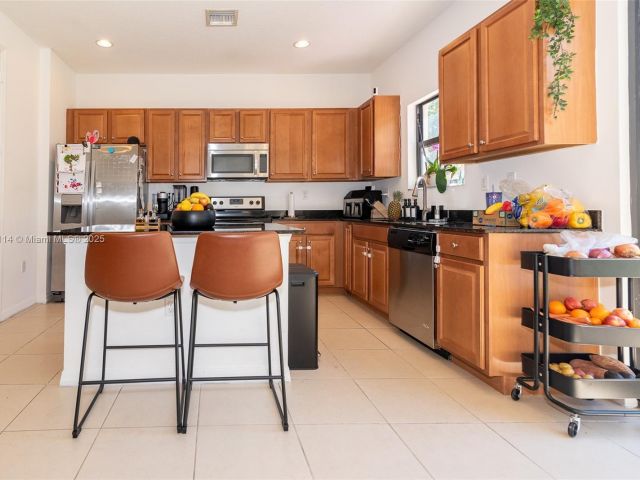 Home for sale at 686 NE 191st Ter - photo 5991048