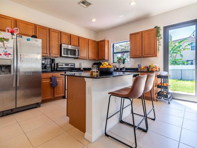 Home for sale at 686 NE 191st Ter - photo 5991049