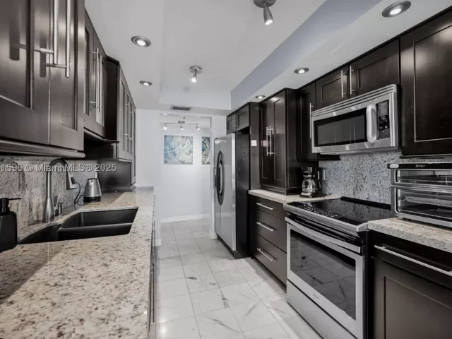 2-bedroom condo for sale in Hallandale Beach - 300 Three Islands Blvd 108 - MondialRealty