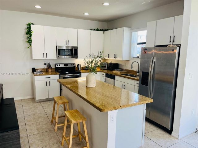 Home for sale at 616 NE 193rd St - photo 5703402