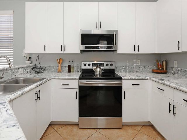 Home for sale at 2250 NE 37th Rd - photo 5845179