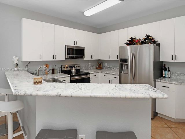 Home for sale at 2250 NE 37th Rd - photo 5845181