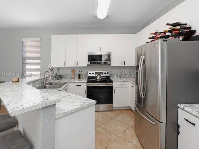 Home for sale at 2250 NE 37th Rd - photo 5845182