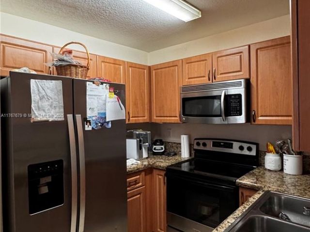 Home for sale at 1033 SW 144th Ave 2705 - photo 5884337