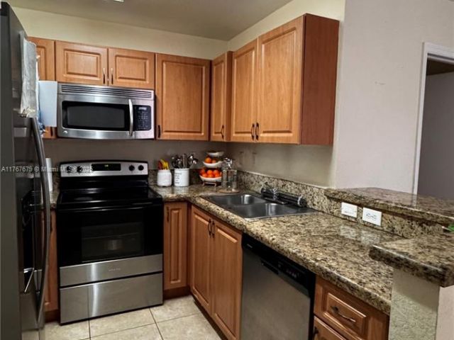 Home for sale at 1033 SW 144th Ave 2705 - photo 5884341