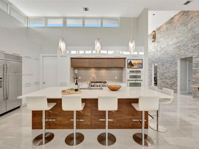 Home for sale at 907 Diplomat Pkwy - photo 5873613