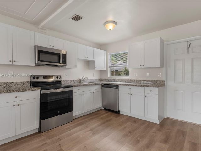 Home for sale at 2649 NE 14th Ter - photo 5881564