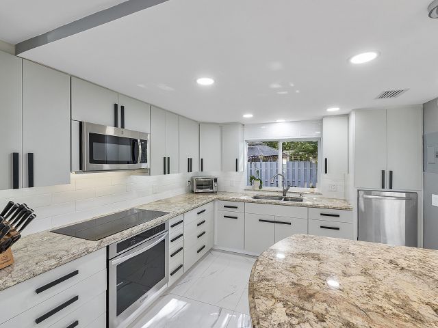 Home for sale at 1900 NE 16 Terrace - photo 5890175