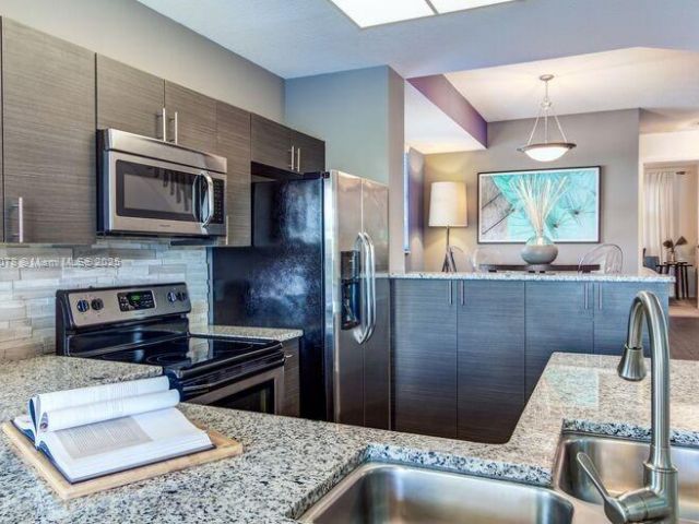 Home for rent at 5555 N Military Trl Riviera - photo 5861840