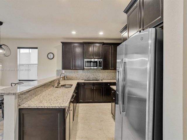 Home for sale at 10075 NW 86th Ter - photo 5859569