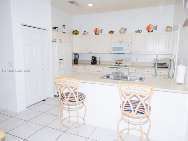 Home for sale at 1735 NW 77th Ave - photo 5883010