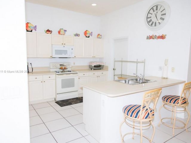 Home for sale at 1735 NW 77th Ave - photo 5883011