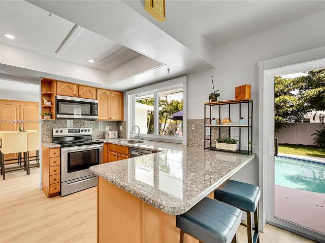 Home for sale at 2133 NE 63rd Ct - photo 5890254