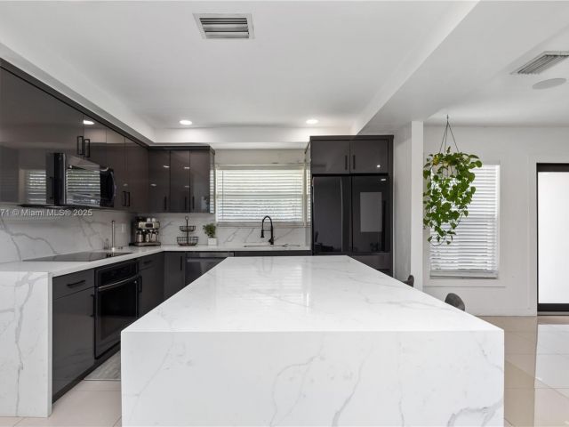 Home for sale at 11810 W Biscayne Canal Rd - photo 5970794