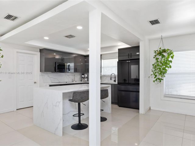 Home for sale at 11810 W Biscayne Canal Rd - photo 5970798