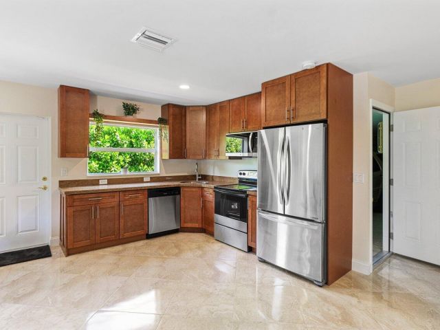 Home for sale at 1650 NE 3rd Avenue - photo 5878966