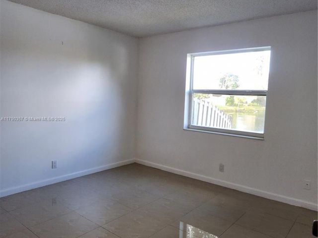 Home for sale at 9711 SW 57th St - photo 5949896