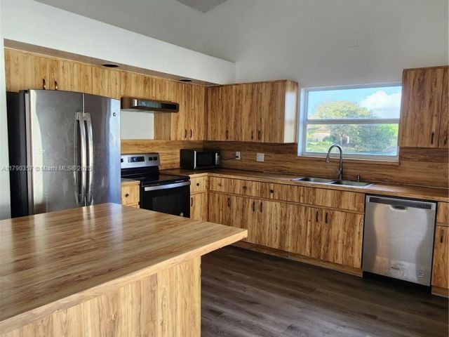 Home for sale at 9711 SW 57th St - photo 5949906