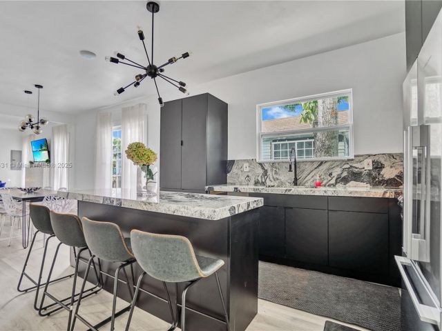 Home for sale at 473 NE 61st St - photo 5885269