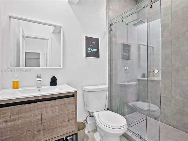 Home for sale at 473 NE 61st St - photo 5885274