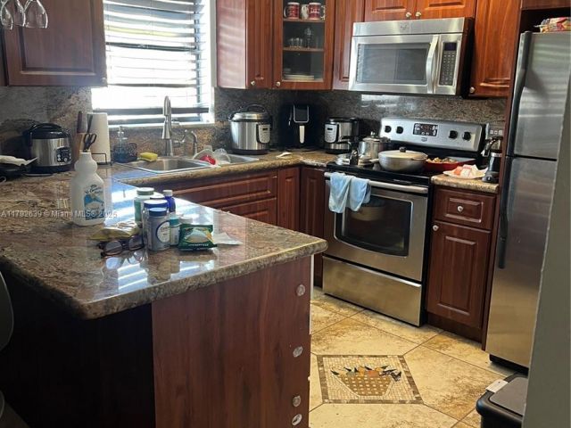 Home for sale at 6725 SW 137th Ct 14D - photo 5955188