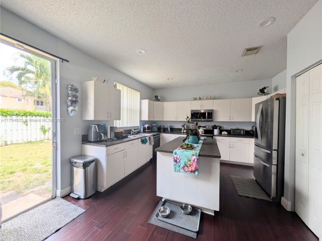 Home for sale at 7683 NW 19th St - photo 5959600