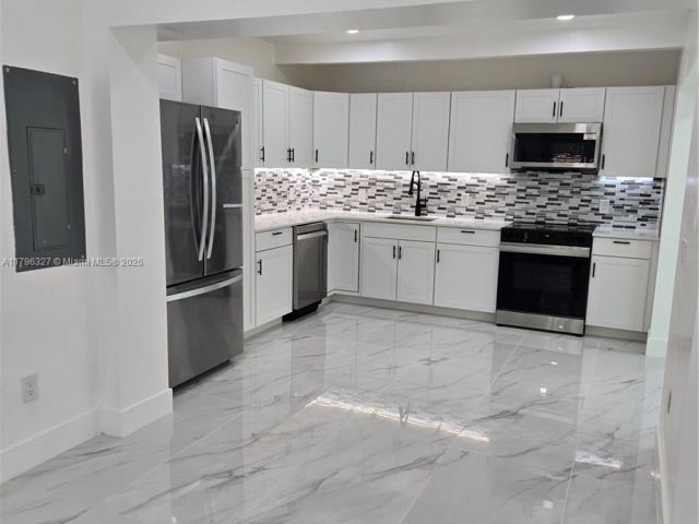 Home for rent at 987 NE 145th St - photo 5968620