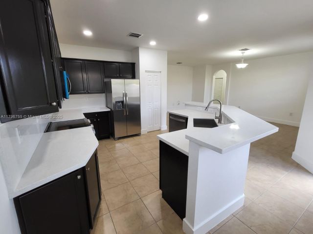 Home for rent at 11729 SW 236th St - photo 6001493