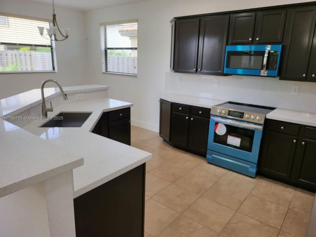 Home for rent at 11729 SW 236th St - photo 6001496