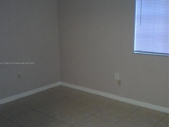 Home for rent at 11795 SW 18th St 3-31 - photo 5973110