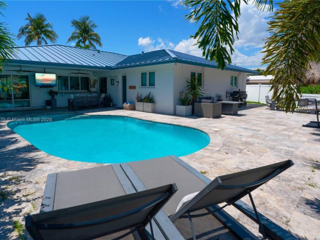 Home for sale at 2711 NE 57th Ct - photo 5979378