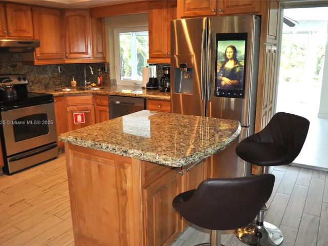 Home for sale at 5111 NE 15th Ave - photo 5979399